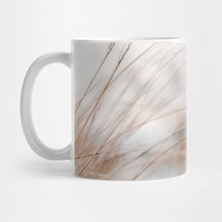 Beach grass in the winter, snow in background Mug